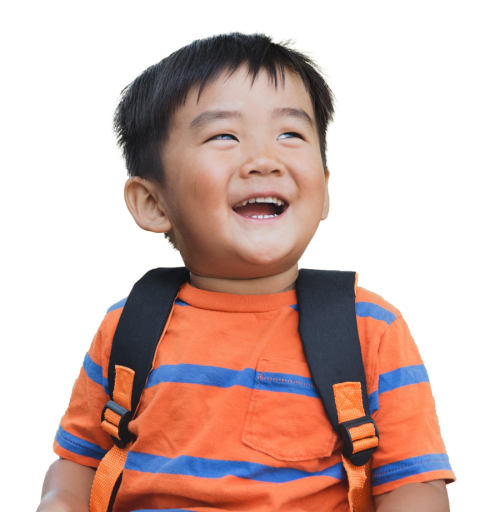 boy smiling wearing backpack